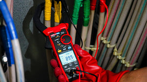 UNI-T UT219P AC Digital Power Clamp Meter – 1000A AC, 1000V, 3-Phase Power up to 3000kW, Harmonics/THD, Power Factor, Phase Sequence, True RMS, Bluetooth 5.0, 75mm Jaw, IP54, CAT IV 600V - its red casing, rotary dial, and a digital display reading 89.9.