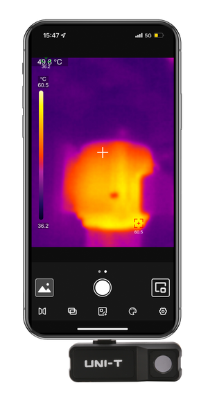 UNI-T UTI120MS Smartphone Thermal Camera Module for IPhone - attached to a smartphone displaying a thermal heat map with temperature readings on screen.
