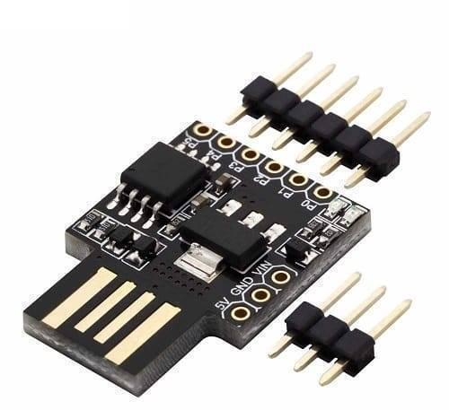 USB Digispark ATTINY85 Developing Board - shown as a black circuit board with a USB connector, pin headers, and labeled ports P0-P5, 5V, GND, and VIN.