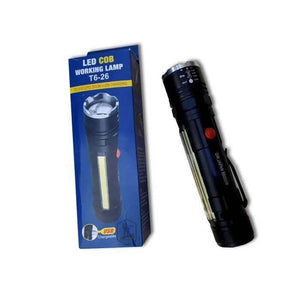 USB Rechargeable Zoomable LED Flashlight Camping Torch Lamp T6-26 USB Charge - shown with its blue cardboard packaging box and the black metal flashlight with a red side button.