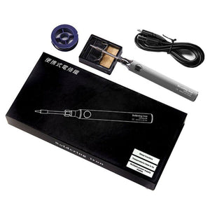 USB Soldering Iron Portable 8W Type C price - shown with its black packaging box, a metal stand with sponge, a spool of solder wire, and a USB charging cable.
