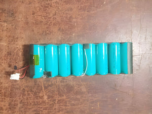 USED 26650 3.2V 3300mAh LiFePO4 Cylindrical Li-ion Batteries - shown as a pack of seven teal cylindrical cells wrapped in plastic with two white connectors.