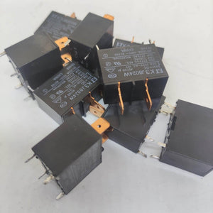 USED Fujitsu Japan JB024W 24V 20A Relay Switch High Current Relay POWER RELAY - a pile of several black rectangular power relays with metal contact pins and printed technical specifications.