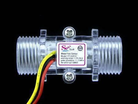 Water Flow Sensor Yf S201C - a clear plastic cylindrical sensor with threaded ends, a central label, and three attached yellow, red, and black wires.