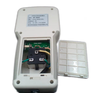 Wholesale HOPI HP-9800 Handheld Power Meter | Power Analyzer & LED Tester | Digilog.pk - with its white plastic back cover removed, revealing the internal fuse, wiring, and a black electrical component.