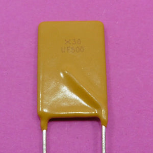 X30 UF500 30V 5A 5000mA Resettable Fuse Radial Leaded PPTC PolySwitch New - a yellow rectangular radial-leaded PPTC component with the text "X30" and "UF500" printed on its surface.