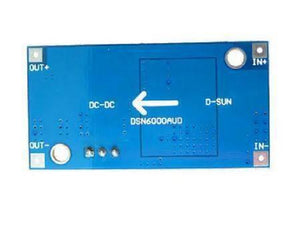 XL6009 Buck Boost Convertor Module - a blue rectangular circuit board with labeled IN+, IN-, OUT+, and OUT- connection points and a white arrow.