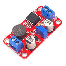 XL6019 5A DC-DC Step Up Boost Converter Price - a red rectangular circuit board featuring a black inductor, a blue potentiometer, and two blue screw terminals.