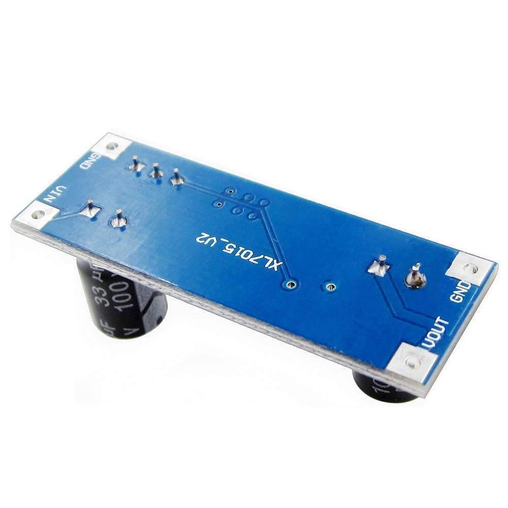 XL7015 DC-DC Buck Converter Step Down Module 5V-80V Wide Voltage Input 7005A Super Than LM2596 - the blue circuit board underside with labeled VIN, GND, and VOUT connection pads and two cylindrical capacitors.