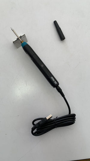 Yaxun USB Cordless Soldering Iron | Portable Wireless Electric Tool - with a black handle, metal tip, small stand, and a detached black cap, connected to a USB cable.