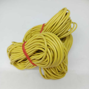 Yellow Solderable Wire Flexible Wires For Wiring Jumper Wire Wiring Wire , Wiring Cable - shown as a coiled bundle of flexible yellow wiring held together by two red rubber bands against a white background.