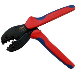 YTH-2546B 2.5/4/6mm Solar Crimper MC3 MC4 Crimping Tool Kit - a black metal crimping tool with red and blue rubberized handles, featuring three distinct crimping slots.