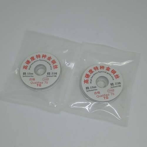 0.05 mm LCD Screen Separation High Hardness Special Gol Wire Cutting Line For Iphone Samsung Glass Wires Tools - two white circular spools of cutting wire individually sealed in clear plastic bags.