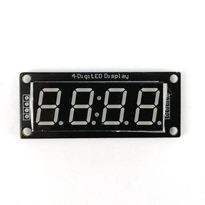 0.56 inch TM1637 7 Segments LED Display Module for Arduino - a black rectangular circuit board with a four-digit seven-segment display and four pin connectors.