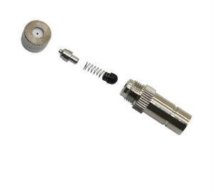 0.5mm Slip Lock Mist Nozzle For 6mm Quick Connector Spray - shown disassembled into its silver metal housing, spring, internal pin, and nozzle cap.