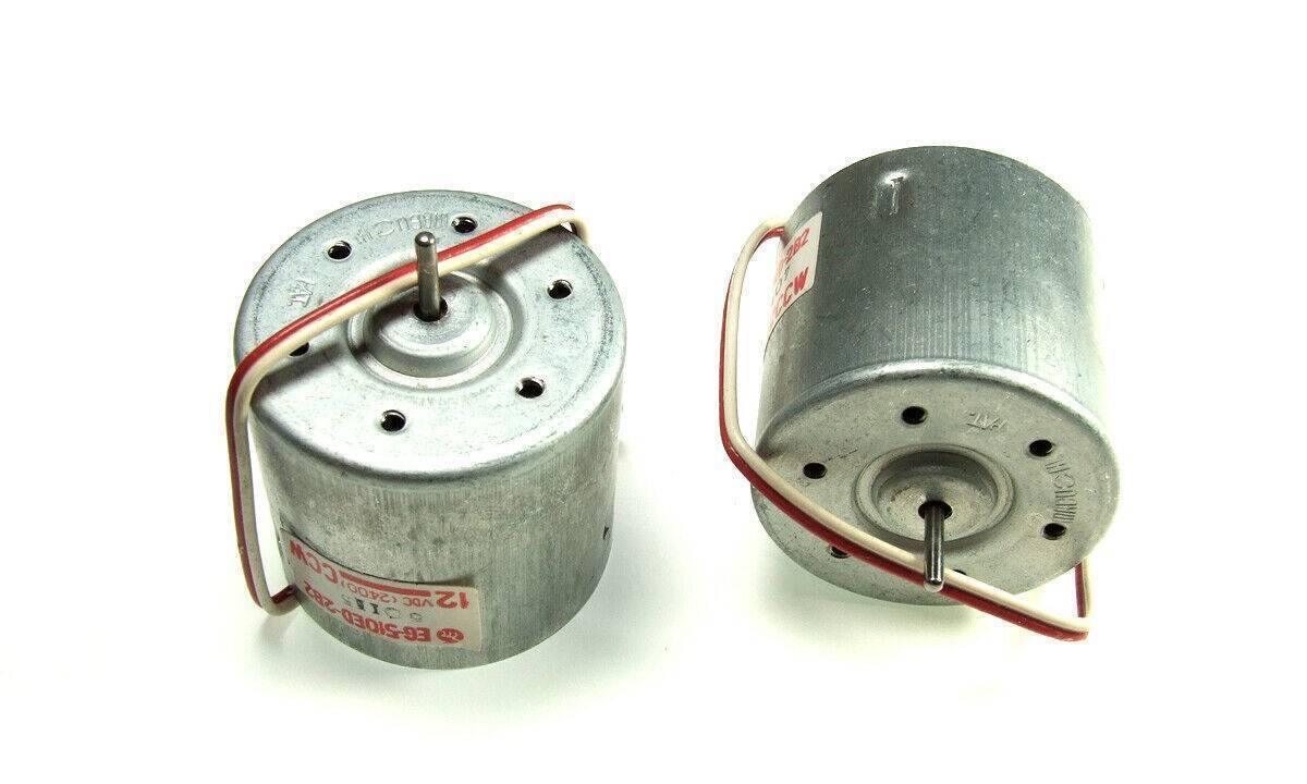 0 To 12V DC Motor Mabuchi Cw 2400RPM - two silver cylindrical DC motors with attached red and white wires and a small rotating shaft.