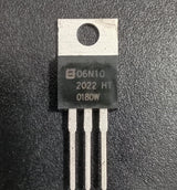 06N10 100V N-Channel Power MOSFET (TO-220) Used - a black TO-220 electronic component with three metal pins and a mounting hole, shown in a top-down close-up view.