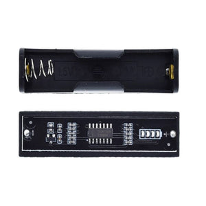1.5V Battery Tester For AA AAA High Precision Capacity Battery Detector With 4 Indicator Lights - a black battery holder with a spring contact and a circuit board featuring an LM324 chip and four battery-level indicators.