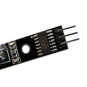 1 Channel Infrared Tracking Sensor Fc 123 Black And White Line Detection Sensor For Smart Car Tracing - a close-up of a black circuit board featuring a 74HC14D chip, surface-mount resistors, and a three-pin connector.