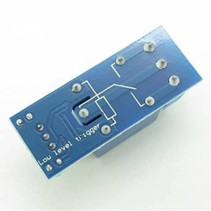 1 Channel Relay Module For Arduino - shown from the bottom, featuring a blue circuit board with exposed metal pins and printed "Low level trigger" text.