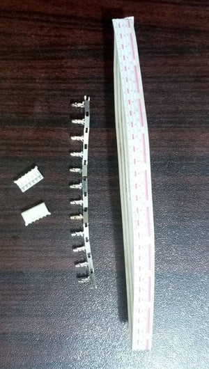 1 Feet 2mm 6 Pin Wire And Connector - a white ribbon cable, a strip of metal crimp terminals, and two small white plastic connector housings.