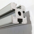1 Meter 2020 Aluminum Profile Aluminium Extrusion For CNC And 3d Printer - a close-up view of the silver metal extrusion showing its square cross-section with T-slots and a central circular hole.