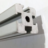 1 Meter 2020 Aluminum Profile Aluminium Extrusion For CNC And 3d Printer - a close-up view of the silver metal extrusion showing its square cross-section with T-slots and a central circular hole.