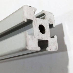 1 Meter 2020 Aluminum Profile Aluminium Extrusion For CNC And 3d Printer - a close-up view of the silver metal extrusion showing its square cross-section with T-slots and a central circular hole.