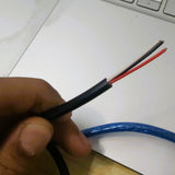 1 Meter 3 Core Cable Red White Black - a close-up of the cable end with the black outer insulation stripped to reveal red, white, and black wires.