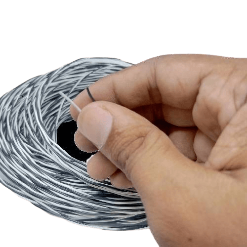 1 Meter Hard Jumper Wires Spiral Wrap Wires Cable - shown as a coiled bundle of silver and white striped wire being held by a hand.