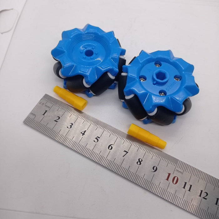 1 Piece 52mm Mecanum Omni Wheels Tires For DIY Rc Robot Toys Tt Motors - two blue wheels with black rollers and two yellow axle connectors placed next to a metal ruler for scale.