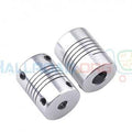 1 Piece 5m x 8mm 5x8mm Flexible Coupling Flexible Shaft Coupling - two silver cylindrical shaft couplings with spiral cuts and small black set screws, shown from an angled perspective.