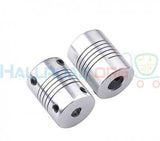 1 Piece 5m x 8mm 5x8mm Flexible Coupling Flexible Shaft Coupling - two silver cylindrical shaft couplings with spiral cuts and small black set screws, shown from an angled perspective.
