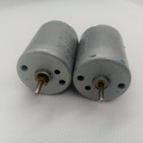 1 Piece DC 2V To 24V 8960RPM High Torque Mini Micro Motor DC Motor - two silver cylindrical DC motors with metal shafts positioned side-by-side on a white surface.