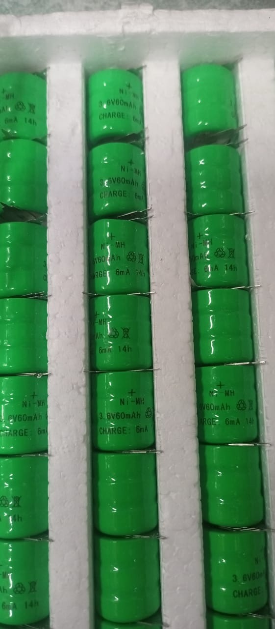 1 Piece Ni Mh 3.6V 60mA Rechargeable Battery - shown as a bulk pack of green cylindrical batteries arranged in white foam packaging.