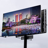 1 Square Feet P5 Outdoor LED Display Module Screen 1 / 8scan Full Color - shown as a large rectangular digital billboard displaying a city night scene.
