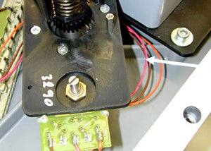 100k Dual Stereo Volume Type Variable Resistor Potentiometer - a close-up showing a black plastic mounting plate, a metal shaft, and a green circuit board.