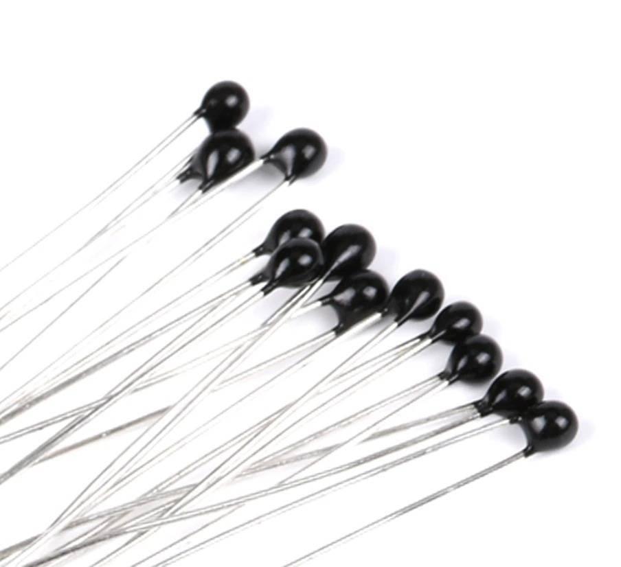 100k NTC Thermistor Thermal Resistor Temperature Sensor NTC-MF52AT - a cluster of small black, teardrop-shaped sensors with dual metal wire leads.