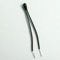 100k Precision NTC Thermistor - shown as a small, black, bead-shaped electronic component with two thin, insulated wire leads extending from the top.
