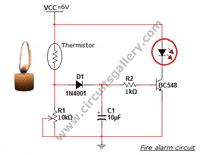 100k Precision NTC Thermistor - shown in a schematic diagram for a fire alarm circuit featuring a candle, LED, diode, capacitor, resistor, and transistor.