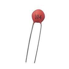 100nF Capacitor 104 Capacitor 0.1uF Capacitor In Paksitan - a red, disc-shaped ceramic capacitor with two long metal wire leads and the number 104 printed on its face.