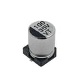 100uF 35V Vt SMD Capacitor | High-quality Surface Mount Capacitor | Digilog.pk - a silver cylindrical surface-mount electrolytic capacitor with a black base and markings reading 100, 35V, and VT.
