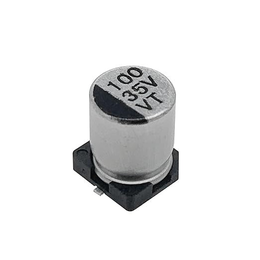 100uF 35V Vt SMD Capacitor | High-quality Surface Mount Capacitor | Digilog.pk - a silver cylindrical surface-mount electrolytic capacitor with a black base and markings reading 100, 35V, and VT.