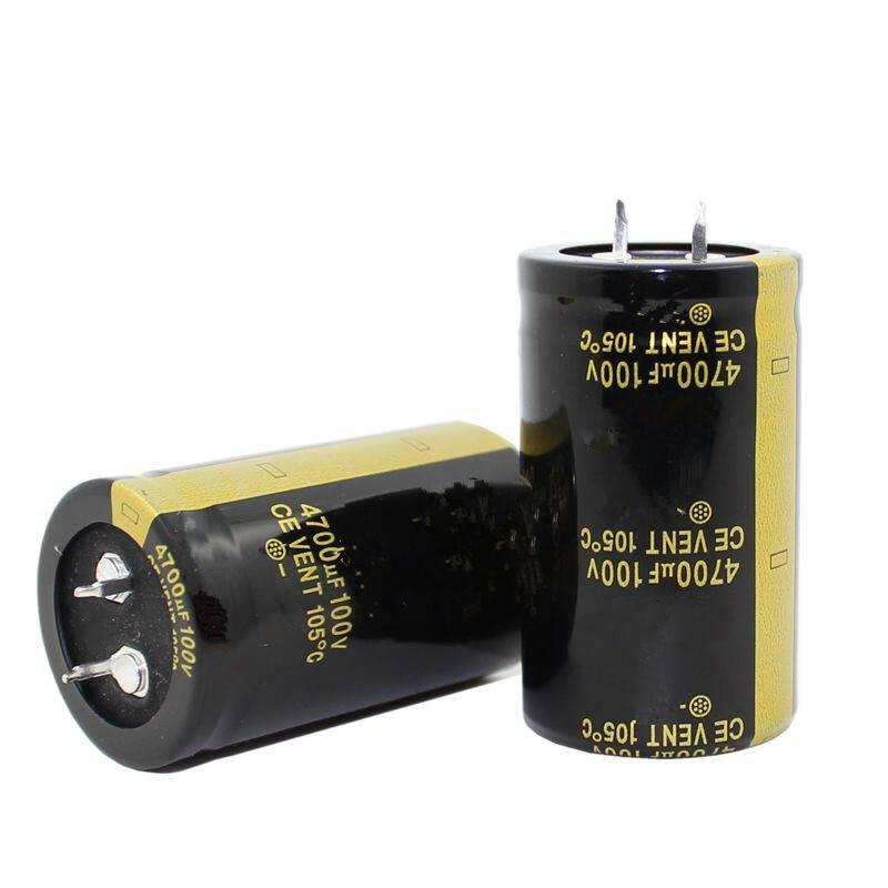 100V 4700uF Electrolytic Capacitors - shown as two black cylindrical components with yellow labels and two metal terminals on top.