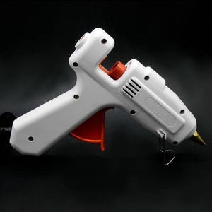 100W Hot Melt Glue Gun SD-a - a white handheld tool with an orange trigger, a metal nozzle, and a wire stand, isolated against a black background.