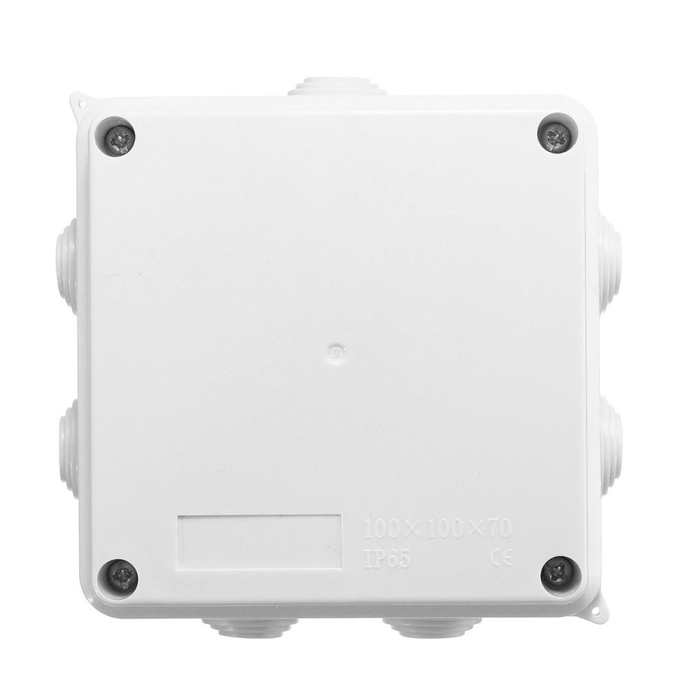100x100x70mm IP65 Waterproof Outdoor Electrical Cctv Enclosure Square Junction Box White ABS - plastic electrical enclosure with four side ports and four corner screws on the top cover.