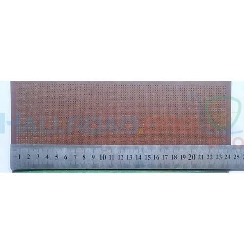 100x240mm Dotted Stripboard Veroboard Prototyping Board - shown with a metal ruler placed along its bottom edge to demonstrate its length.
