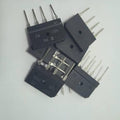 10A Bridge Rectifier - a group of black, rectangular electronic components with four metal pins each, arranged in a scattered pile.