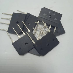 10A Bridge Rectifier - a pile of black, rectangular electronic components with four metal pins each, featuring visible markings like GBJ and 8J.