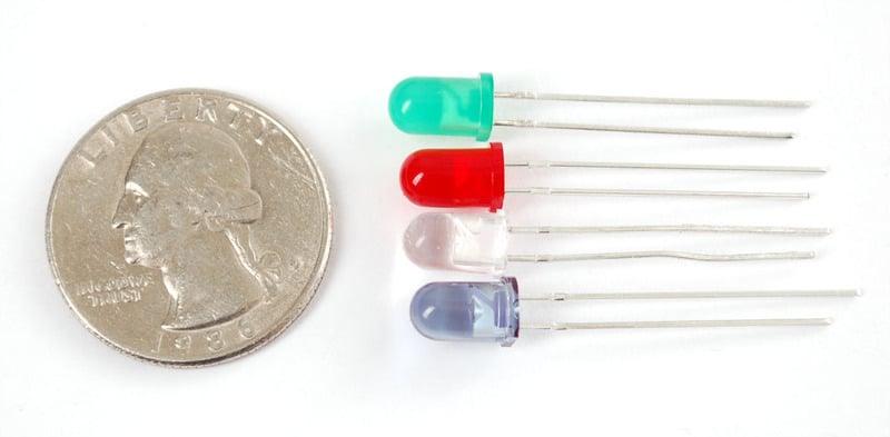 10mm Red LED Light Emitting Diode - shown alongside a US quarter coin and three other LEDs of different colors for size comparison.
